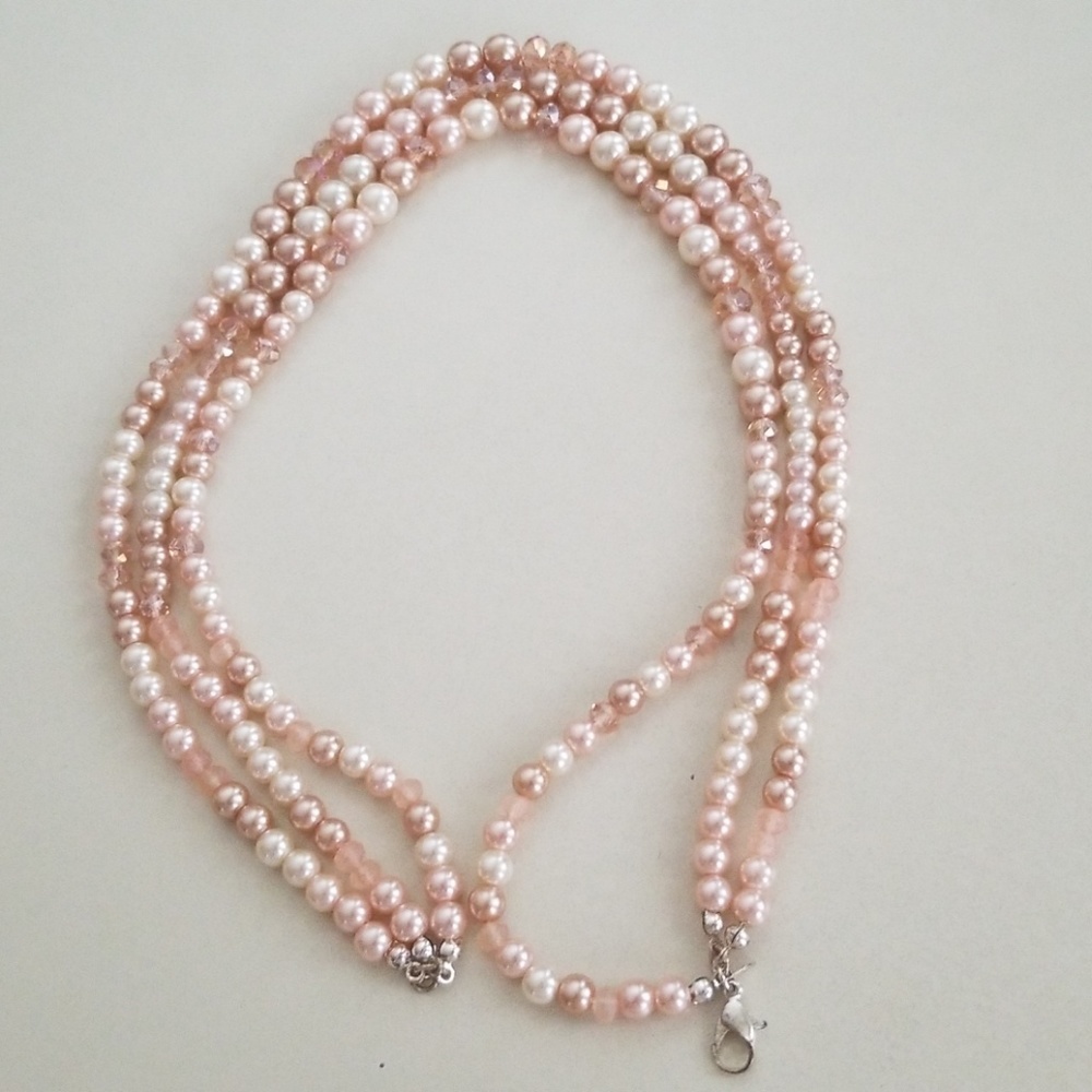 Coral/peach double strand necklace.